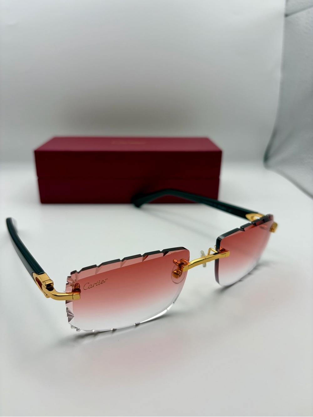 Cartier Men’s Rimless Gradient Red Sunglasses with Gold Accents - Picture 2 of 7